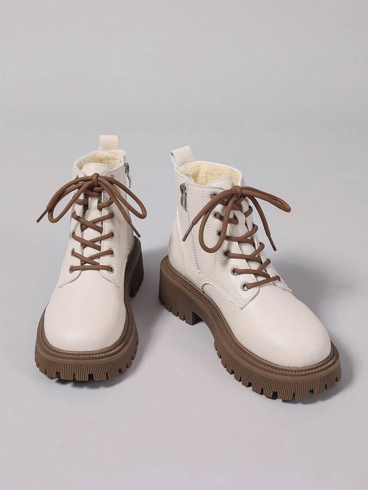 White laced boots