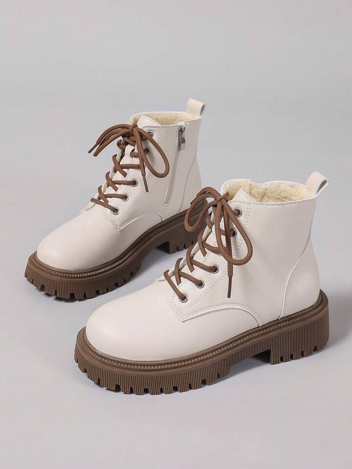 White laced boots