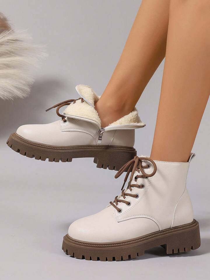 White laced boots