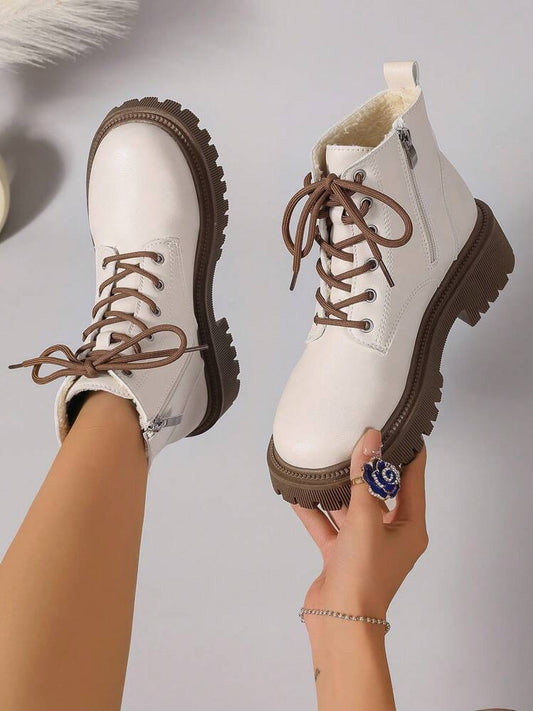 White laced boots