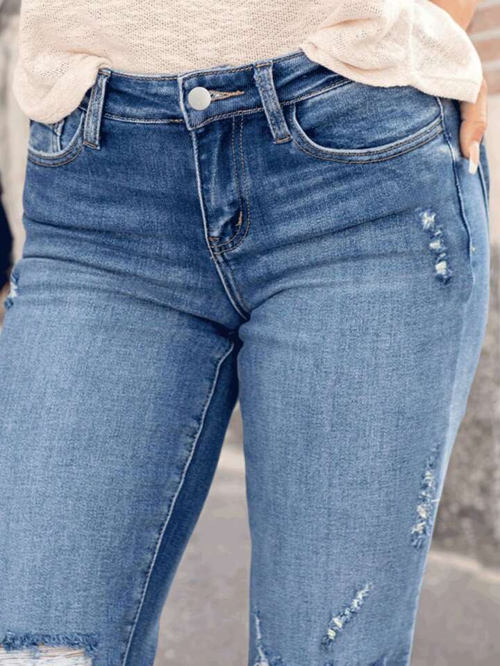 Medium wash cuffed denim jeans
